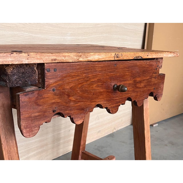 Spanish Country side table with drawer. Made of antique pine called "mobila", this table is very functional and you can...