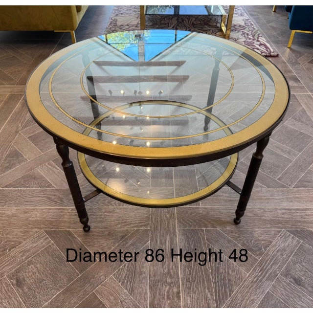 A beautiful and extremely high quality French Round Coffee Table. It came from Paris and the base made of solid brass, the...