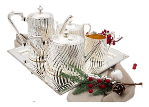 Modernist Silver Tea Service with Tray in Relief, Set of 4