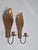 A paif of classic shell shaped candle sconces in solid brass by Lars Holmström, Arvika, Swedish Modern 1940s. A simple...