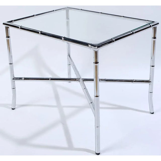 Framed elegantly with bamboo-form chromed steel, this versatile end table can be used in many ways