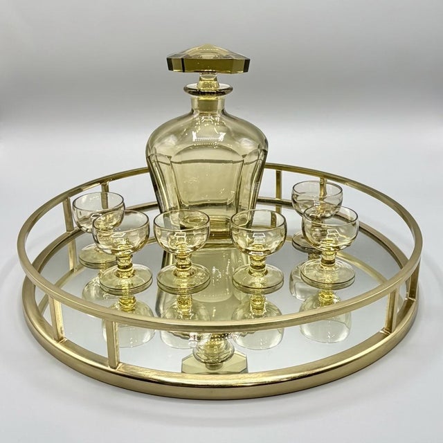 Mid-Century Goldenrod Yellow Glass Decanter and Six Liqueur Glasses in Art Deco Style, Set of 7 An elegant mid-century...