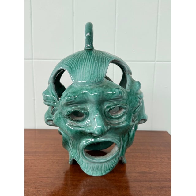 This handcrafted ceramic piece was created and signed by Acabbo, a renowned Amalfi ceramics company. The figure has a...