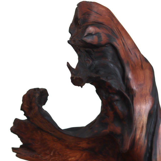 Joe Garnero’s medium of choice for his winding abstract wood sculptures is reclaimed Redwood roots, which he finds along...