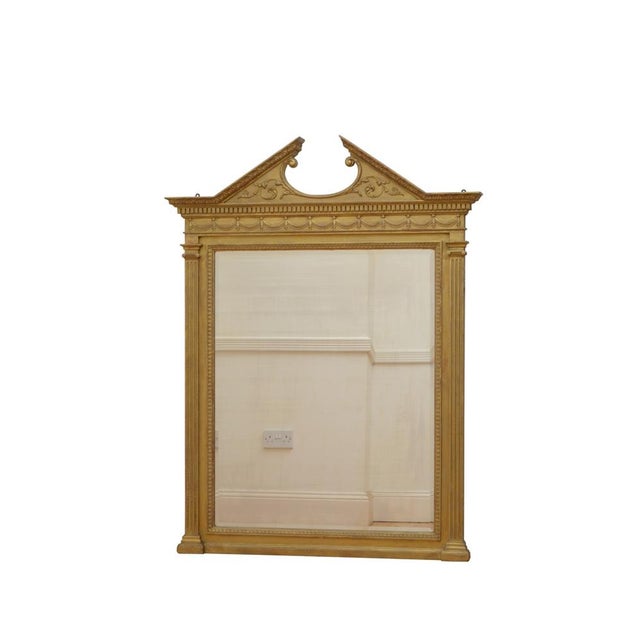 P0270 a victorian gold wall mirror, having architectural pediment with acanthus leaf carved moulding, scrolls and dentil...