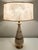 Break out the vinyl records! This vintage ceramic lamp is the perfect hit of "retro" for your space. While there is some...