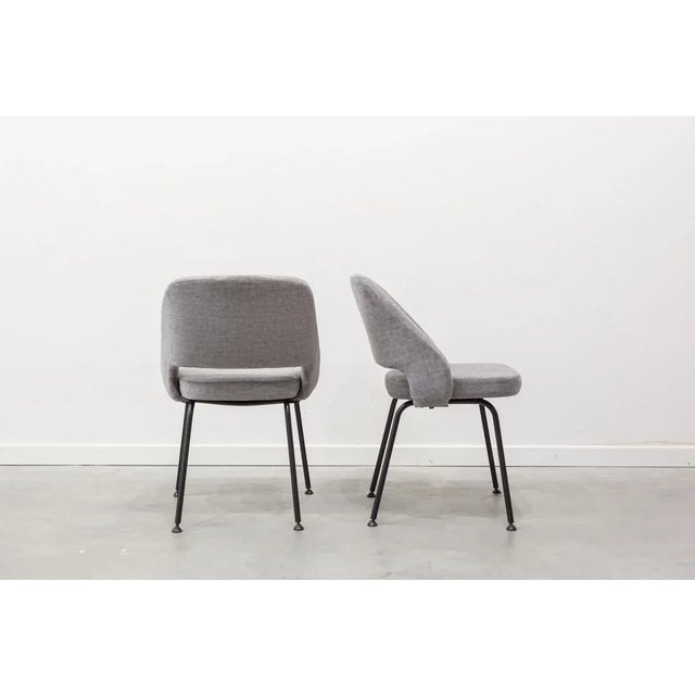 Pair of vintage chairs with black patinated metal structure, fabric seat and backrest. Completely restored and reupholstered.