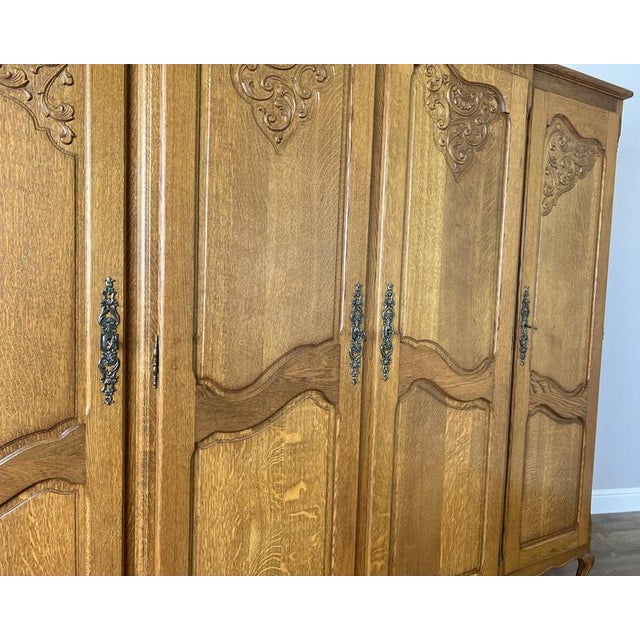 Vintage French Louis XVI Oak Four Door Carved Armoire For Sale - Image 5 of 12