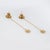 Finely detailed pair of pre-owned Anthony Lent Sunface star drop earrings crafted in 18k yellow gold. From the celestial...
