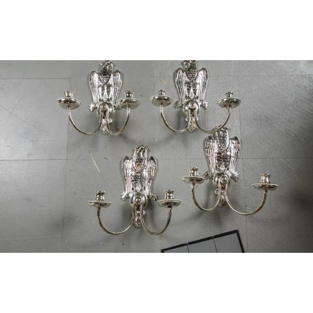 A circa 1920 American federal style silver plated Eagles sconces with 2 lights