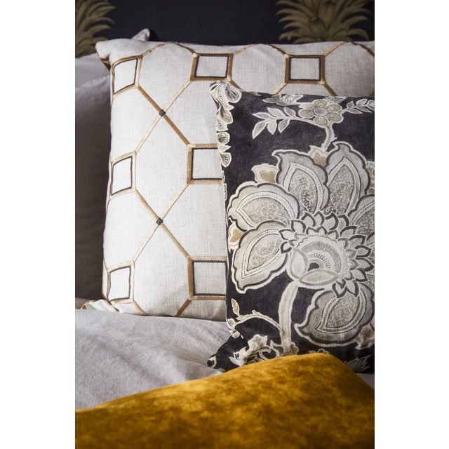Inspired by graphic Baroque ceilings this smart geometric embroidery fabric is created with fine viscose stitching on a...
