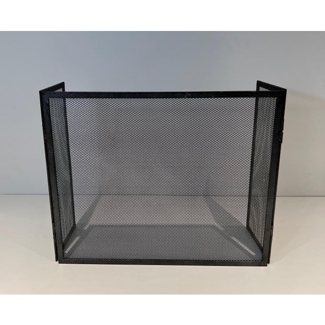 This fireplace screen is made of steel with mesh. This is a very simple design and French work. Circa 1970