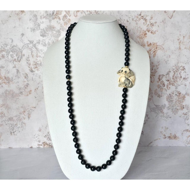 An extraordinary and deeply charming necklace, where sculptural elegance meets quiet whimsy. This rare piece is crafted...