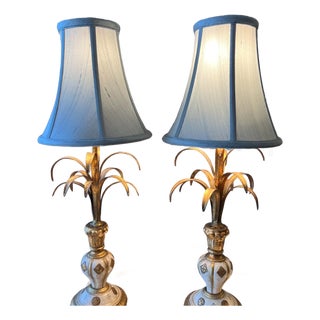 Gorgeous pair of two vintage Florentine giltwood and tole lamps // carved wood and metal palm style lamp bases // gilt and gesso // Italian For Sale