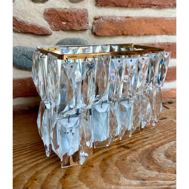 Elegant vintage wall sconce from the 1960s–1970s in the style of renowned German luxury lighting manufacturer Palwa. This...