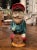 Colorful and highly expressive, this antique barbotine pitcher depicts a Belgian soldier seated confidently upon a barrel....