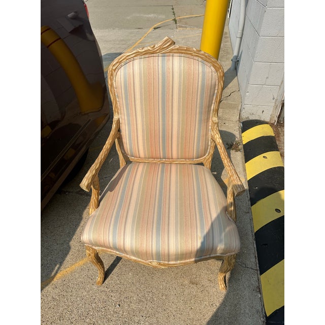 Beautifully crafted open armchair attributed to A. Rudin Designs.Designed to emulate a piece made of tree branches and...