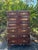 Striking pair of vintage Anglo-Indian style campaign chests crafted in richly toned rosewood, featuring beautifully carved...