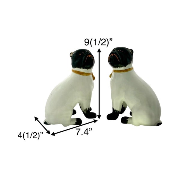 This pair of Italian porcelain dog statues is perfect for home decor. Crafted by Home Decor, these figurines showcase a...