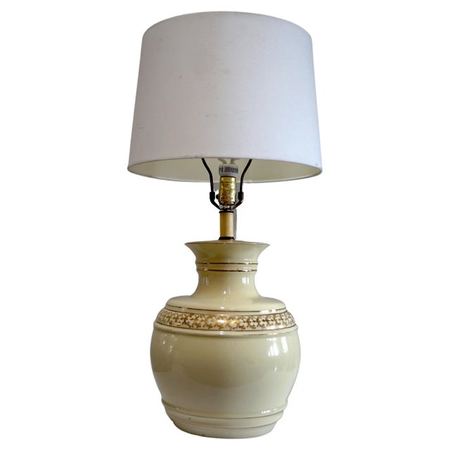 A band of delicate gold etching surrounds this lamp and creates a real sense of elegance and formality. A parcel gilt...