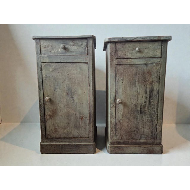 Antique pair of Louis Philippe style walnut bedside tables, fully restored and finished with an aged patina for an...