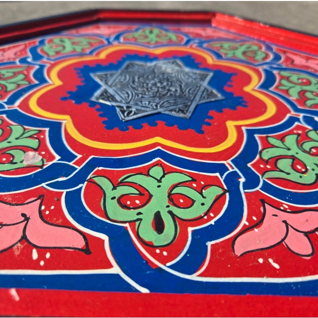 Add a bold splash of color and authentic Moroccan artistry to your home with this beautiful hand-painted side table....