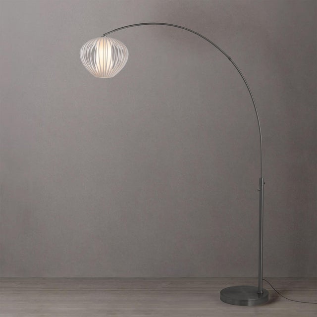 The Float Arc Lamp is a sleek and modern arc lamp featuring a Black Nickel steel body and a Sphere White Satin steel...