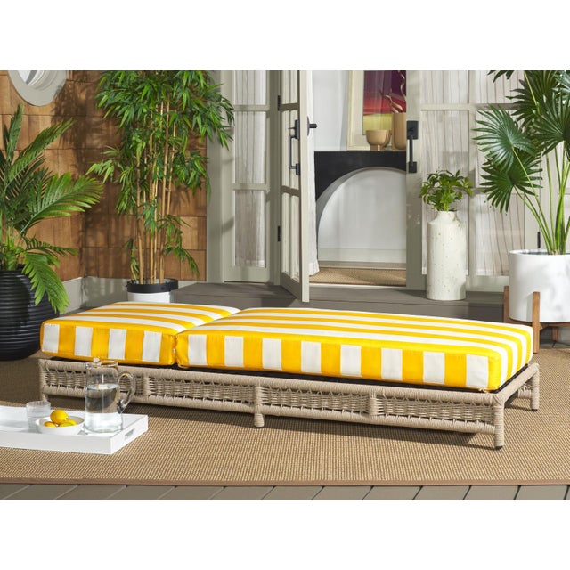 Elevate your outdoor relaxation experience with the Callan Lounger in Heather Tan and Yellow Stripe. This striking piece...