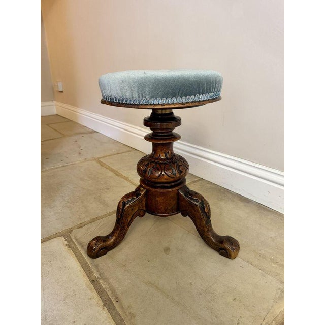 Quality antique Victorian carved walnut stool, having a quality antique Victorian revolving stool with a circular shaped...