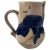 A piece both functional and poetic, this 7-inch studio art pottery pitcher is a study in balance, texture, and tone. The...