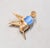 1960s textured goldtone baby blue with white swirl resin cabochon belly with small round faux-ruby eye hummingbird brooch...