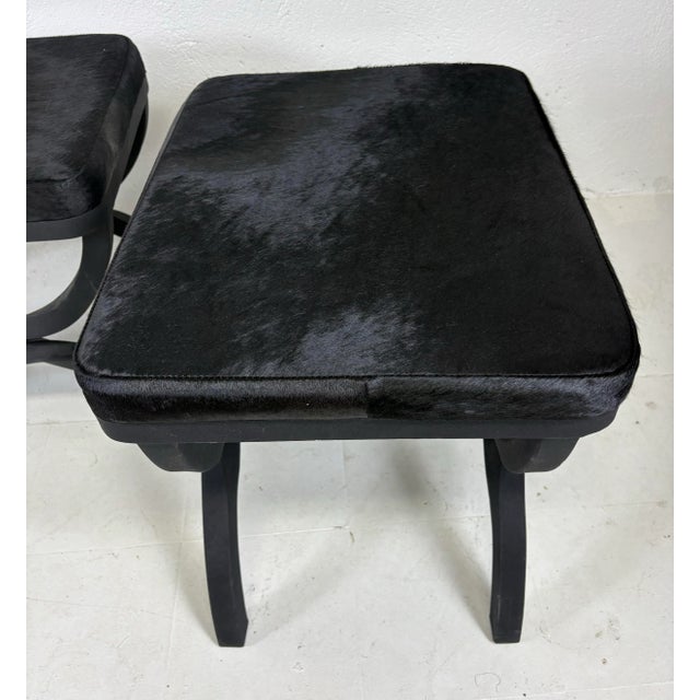 This is a pair contemporary hand wrought iron empire inspired benches. These wrought iron benches have a twisted pattern...