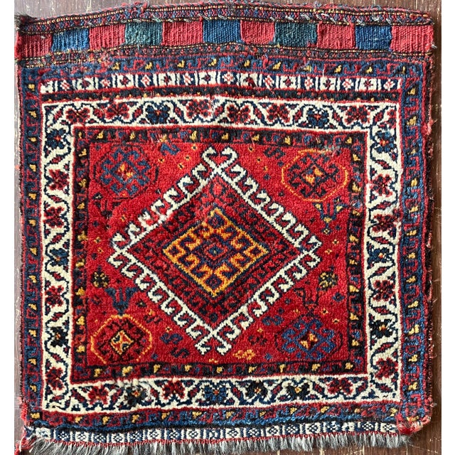 The pattern is tied from memory and often consists of a centrally placed medallion, repeated in all four corners. Humans,...