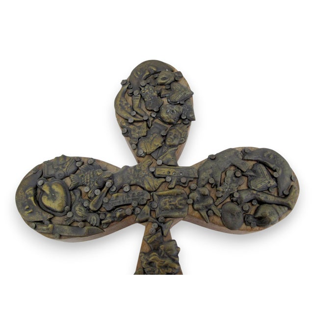 Wonderful Mexican Milagros wall cross, a prominent form of Mexican folk art handmade by nailing dozens of small metal...