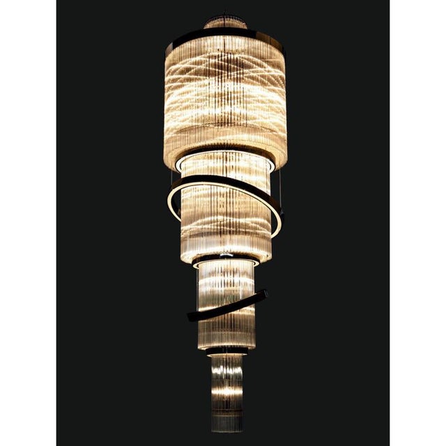 Collection saturno chandelier, metal and crystal, ncs 043/100 by jago dimensions: d 100 x h 330 cm. Materials: metal,...