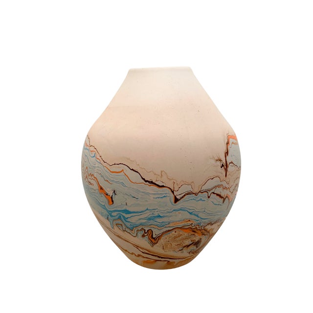 This vintage Nemadji Pottery vase features the distinctive marbled clay swirl pattern the maker is known for, with layered...