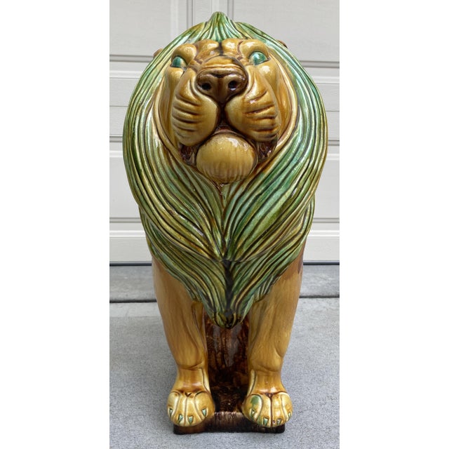Majestic vintage ceramic lion sculpture made in Italy. Regal posture on deeper brown platform. Hand-painted and glazed in...