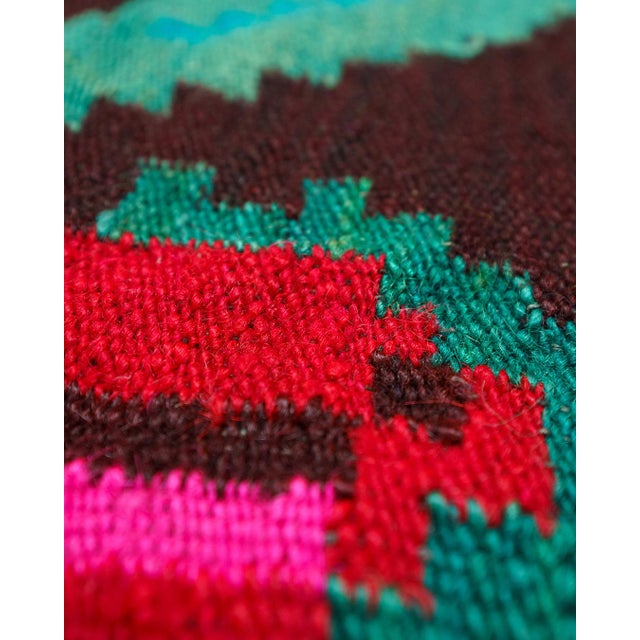 Vintage handwoven wool kilim-style runner rug with bold “pixel” rose bouquets in vivid fuchsia/magenta and teal/turquoise...