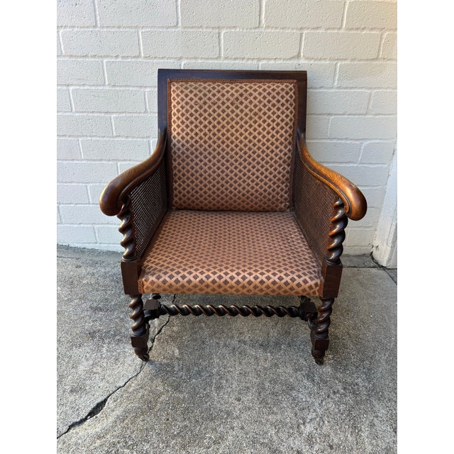 Victorian Antique Oak Bergere Armchair Featuring Barley Twist Legs, Arms, and Stretchers, With Cane Paneling Sides and Caster Wheels For Sale - Image 3 of 11