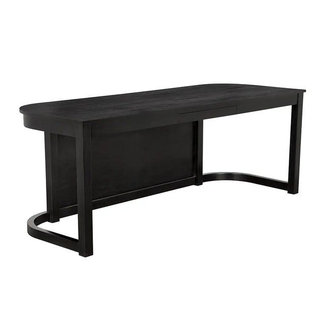 A Charcoal Black finished wood desk with a softened-rectangular top, planar front, and asymmetric U-shaped base that...