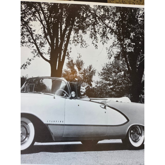 A set of four original large photos of automobiles. 1950s.