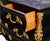 19th Century French Louis XV Ebonized Gilt-Bronze Mounted Bombé Marble-Top Chest A dramatic late 19th-century French Louis...