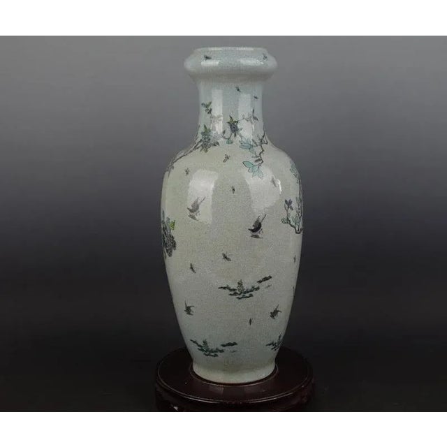 H-46.5cm,W-23cm This Chinese Vintage Porcelain Vase from the Qing Dynasty is expertly marked with a Qianlong seal and...