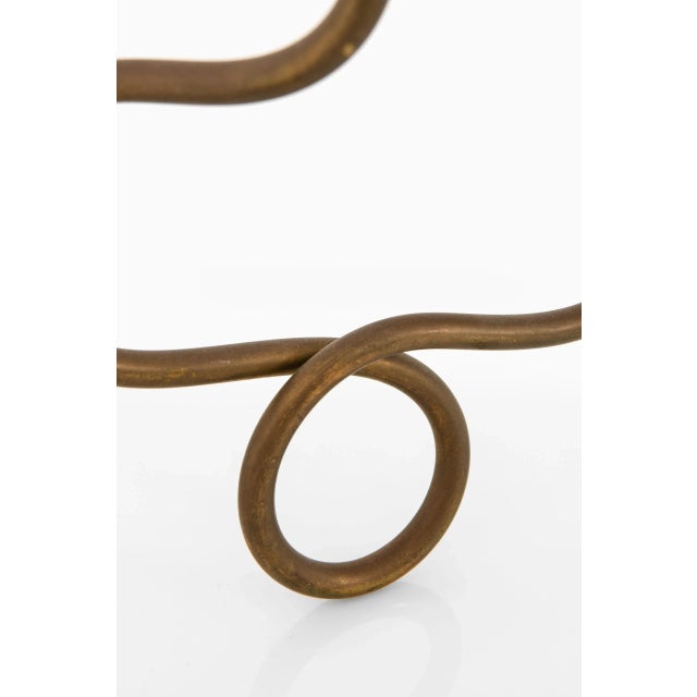 Rare and early candlestick designed by Josef Frank. Produced by Svenskt Tenn in Sweden. Wear consistent with age and use....