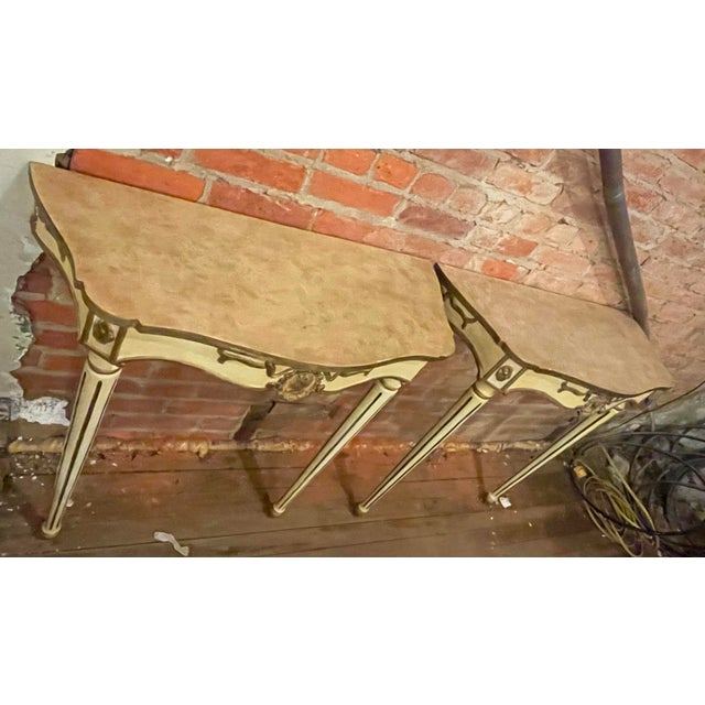 This is the sweetest pair of small wall mounted console or pier tables each having two fluted legs. The pair have been...
