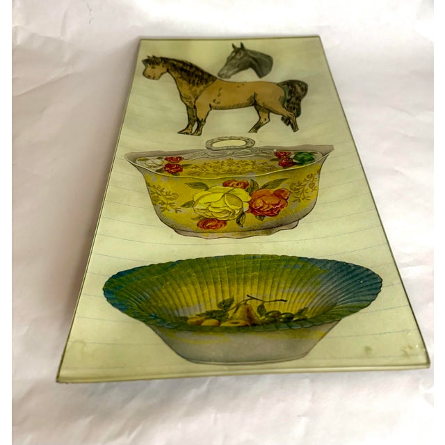 A wonderfully eccentric signed decoupage glass tray by John Derian Company, combining antique equestrian imagery with...