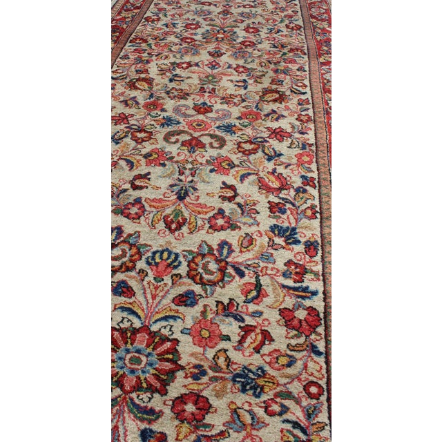 Antique Persian Sarouk Runner With Intricate Floral Pattern and Vibrant Red For Sale In Atlanta - Image 6 of 8