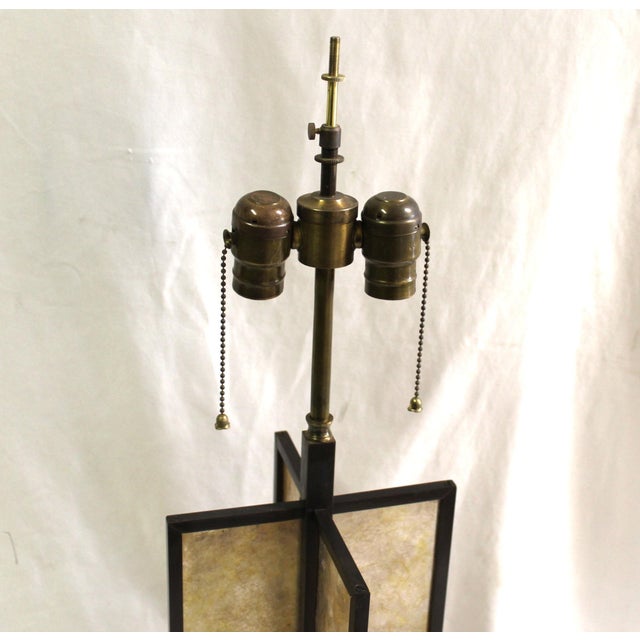 A rare Lamp to find now. Custom made in solid Brass with acid Black patina. Main body has machined (Mica) panels that fit...