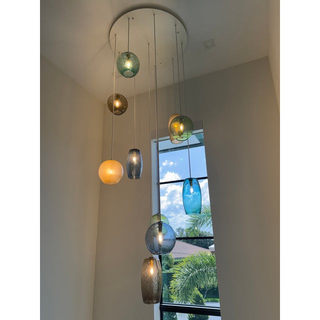 Tracy Glover, the studio’s founder and lead designer, has studied the art of glass blowing for more than two decades....