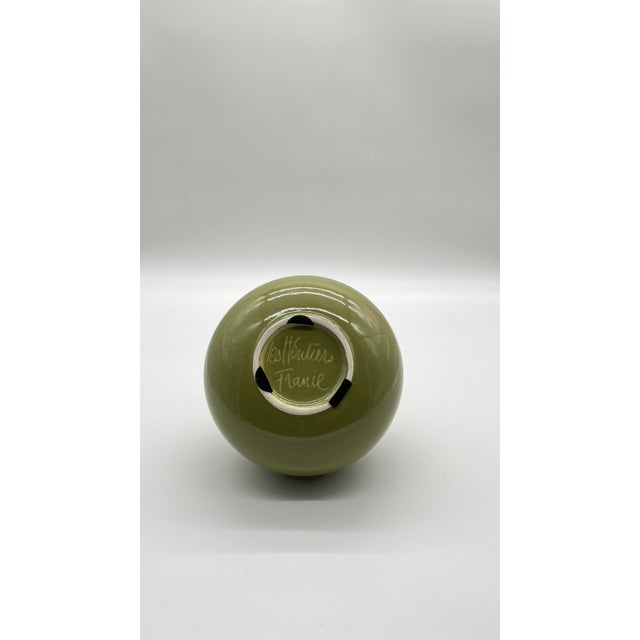 Good evening, I am selling this large, round, green glazed ceramic vase. Designed by Aimé Cécile for "Les Héritiers"...